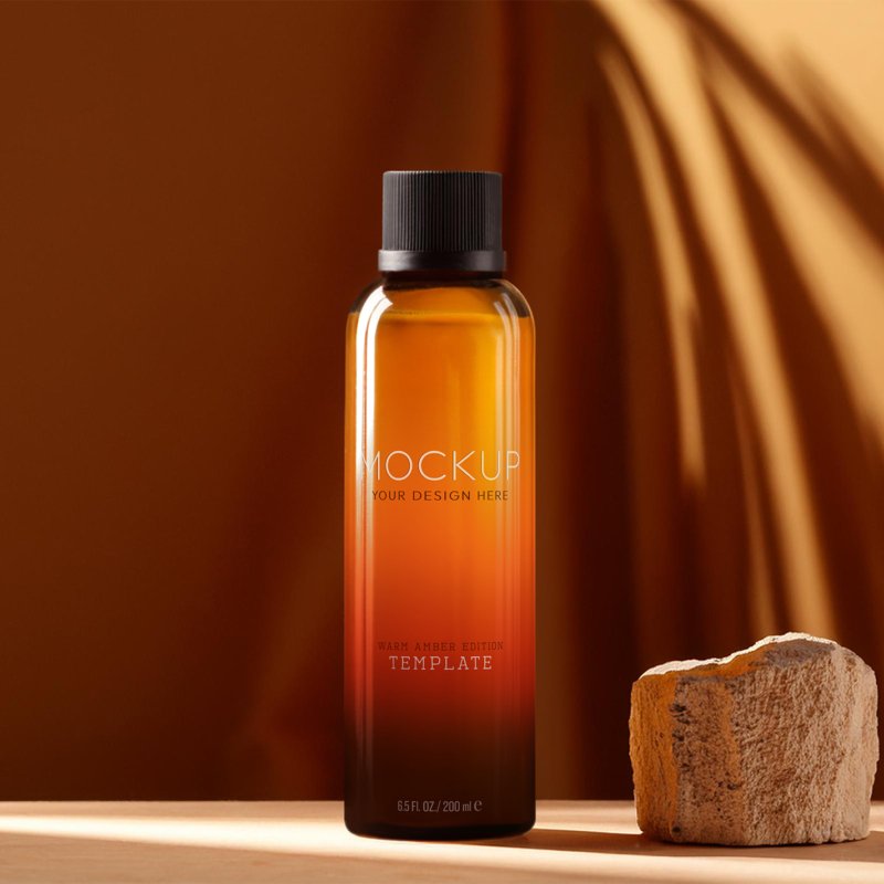Warm-Orange-Cosmetic-Bottle-Mockup-and-Natural-Rocks