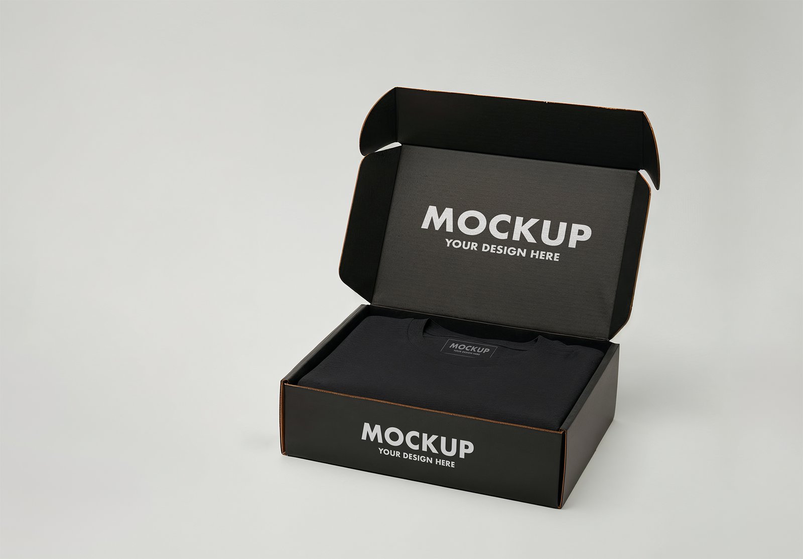 Thumbnail of a Single Folded T-Shirt Packaging Mockup in a Black Cardboard Box