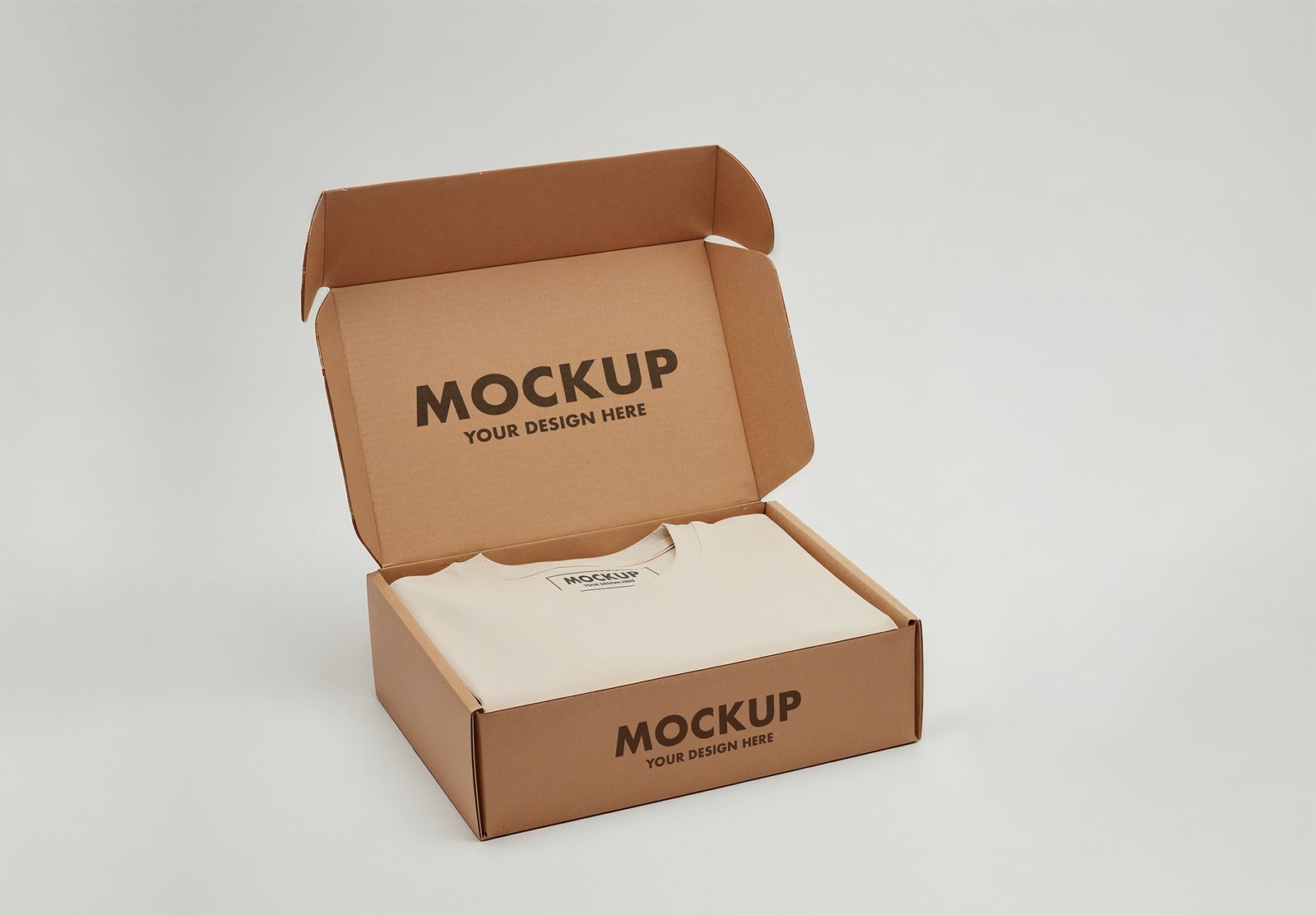 Thumbnail of a Single Folded T-Shirt Packaging Mockup in a Kraft Cardboard Box