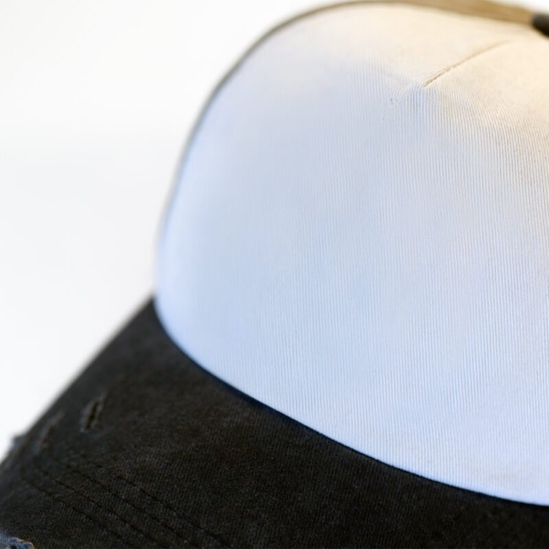 PREV1 Distressed Trucker Hat Mockup Close Up on White Background Distressed Trucker Hat Mockup Close Up on White Background prev