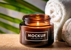 Aromatic Amber Glass Candle Jar Mockup In A Spa With Towels