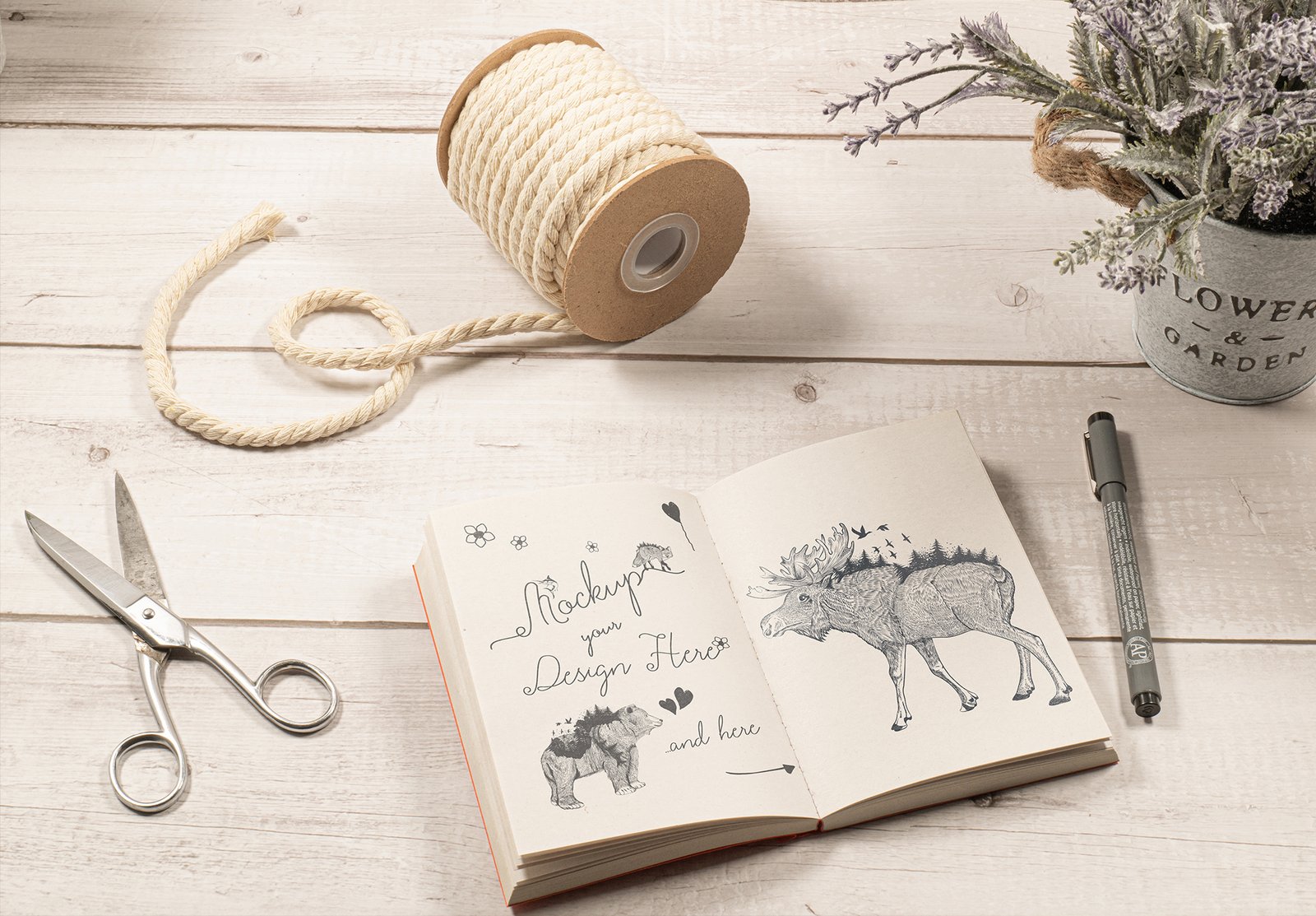 The Sketch Book Mockup In The White Wood Table With Beautiful Flowers From The Garden And Some Scissors